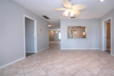 One or more photo(s) has been virtually staged. A lovely pond on Sandpiper Golf Club in Florida - for sale on GolfHomes.com, golf home, golf lot