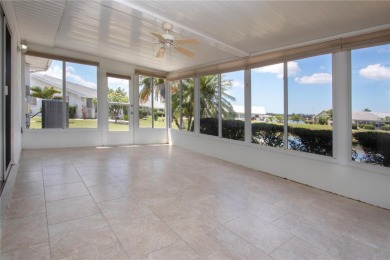 One or more photo(s) has been virtually staged. A lovely pond on Sandpiper Golf Club in Florida - for sale on GolfHomes.com, golf home, golf lot