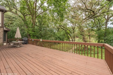 Step into this stunning 5-bedroom, 2.5-bath home, perfectly on Carriage Greens Country Club in Illinois - for sale on GolfHomes.com, golf home, golf lot