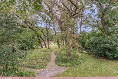 Step into this stunning 5-bedroom, 2.5-bath home, perfectly on Carriage Greens Country Club in Illinois - for sale on GolfHomes.com, golf home, golf lot