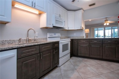 One or more photo(s) has been virtually staged. A lovely pond on Sandpiper Golf Club in Florida - for sale on GolfHomes.com, golf home, golf lot