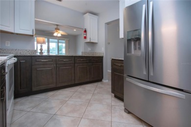 One or more photo(s) has been virtually staged. A lovely pond on Sandpiper Golf Club in Florida - for sale on GolfHomes.com, golf home, golf lot