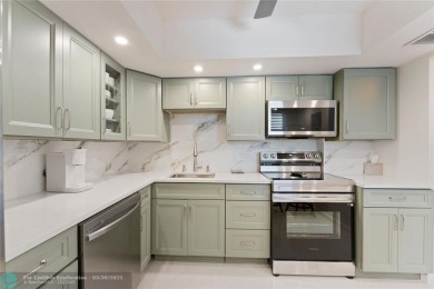 Tastefully renovated top floor corner unit with lots of natural on Inverrary Country Club in Florida - for sale on GolfHomes.com, golf home, golf lot