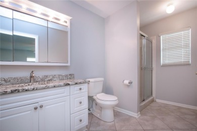 One or more photo(s) has been virtually staged. A lovely pond on Sandpiper Golf Club in Florida - for sale on GolfHomes.com, golf home, golf lot