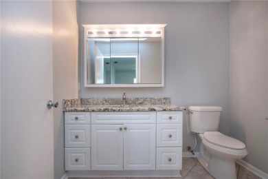 One or more photo(s) has been virtually staged. A lovely pond on Sandpiper Golf Club in Florida - for sale on GolfHomes.com, golf home, golf lot