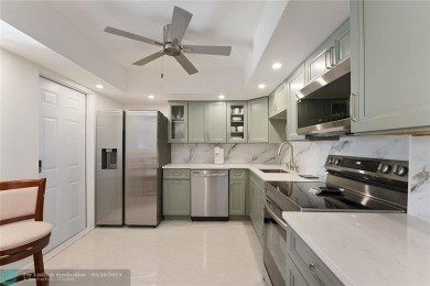 Tastefully renovated top floor corner unit with lots of natural on Inverrary Country Club in Florida - for sale on GolfHomes.com, golf home, golf lot