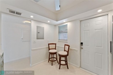 Tastefully renovated top floor corner unit with lots of natural on Inverrary Country Club in Florida - for sale on GolfHomes.com, golf home, golf lot