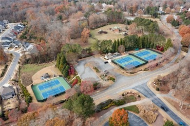 Located in the prestigious Woodmont Golf  Country Club, this on Woodmont Golf and Country Club in Georgia - for sale on GolfHomes.com, golf home, golf lot