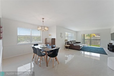 Tastefully renovated top floor corner unit with lots of natural on Inverrary Country Club in Florida - for sale on GolfHomes.com, golf home, golf lot