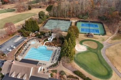 Located in the prestigious Woodmont Golf  Country Club, this on Woodmont Golf and Country Club in Georgia - for sale on GolfHomes.com, golf home, golf lot