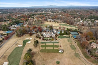 Located in the prestigious Woodmont Golf  Country Club, this on Woodmont Golf and Country Club in Georgia - for sale on GolfHomes.com, golf home, golf lot