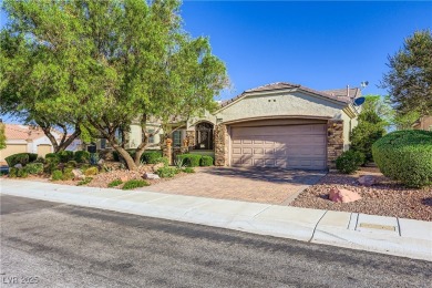An extended Independence model home that features two master on Revere Golf Club in Nevada - for sale on GolfHomes.com, golf home, golf lot
