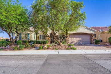 An extended Independence model home that features two master on Revere Golf Club in Nevada - for sale on GolfHomes.com, golf home, golf lot