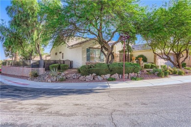 An extended Independence model home that features two master on Revere Golf Club in Nevada - for sale on GolfHomes.com, golf home, golf lot