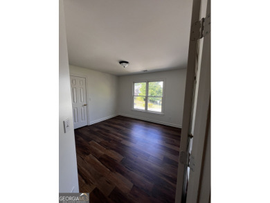 Beautiful home has been fully renovated, inside and outside on Country Club of Gwinnett in Georgia - for sale on GolfHomes.com, golf home, golf lot