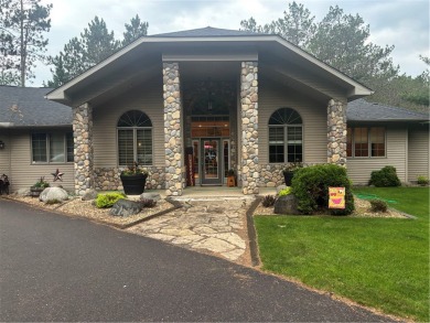 Discover this gem with everything you could wish for. Located on on Spider Lake Golf Resort in Wisconsin - for sale on GolfHomes.com, golf home, golf lot