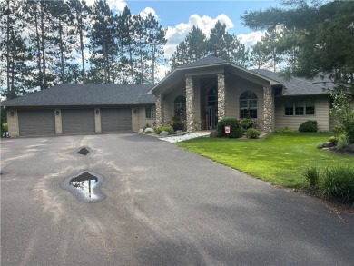 Discover this gem with everything you could wish for. Located on on Spider Lake Golf Resort in Wisconsin - for sale on GolfHomes.com, golf home, golf lot