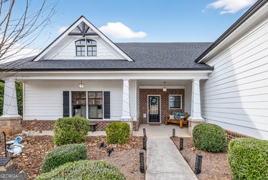 Welcome to this stunning ranch-style home in the highly on Traditions of Braselton Golf Club in Georgia - for sale on GolfHomes.com, golf home, golf lot