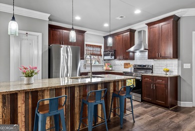 Welcome to this stunning ranch-style home in the highly on Traditions of Braselton Golf Club in Georgia - for sale on GolfHomes.com, golf home, golf lot