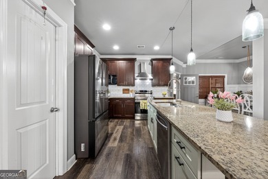 Welcome to this stunning ranch-style home in the highly on Traditions of Braselton Golf Club in Georgia - for sale on GolfHomes.com, golf home, golf lot