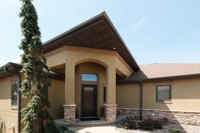 Exquisite design features, functional and luxurious living on The Ridge Golf Club in Iowa - for sale on GolfHomes.com, golf home, golf lot