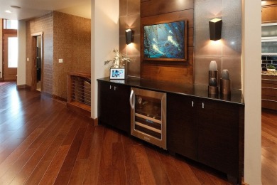 Exquisite design features, functional and luxurious living on The Ridge Golf Club in Iowa - for sale on GolfHomes.com, golf home, golf lot