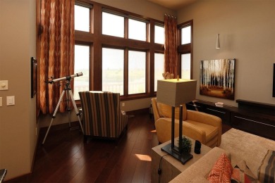 Exquisite design features, functional and luxurious living on The Ridge Golf Club in Iowa - for sale on GolfHomes.com, golf home, golf lot