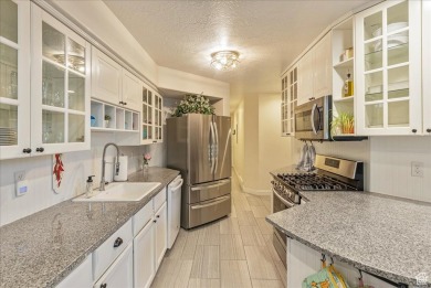 This renovated end-unit condo, featuring 3 bedrooms and 2.5 on Forest Dale Golf Club in Utah - for sale on GolfHomes.com, golf home, golf lot