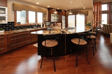 Exquisite design features, functional and luxurious living on The Ridge Golf Club in Iowa - for sale on GolfHomes.com, golf home, golf lot