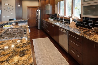 Exquisite design features, functional and luxurious living on The Ridge Golf Club in Iowa - for sale on GolfHomes.com, golf home, golf lot
