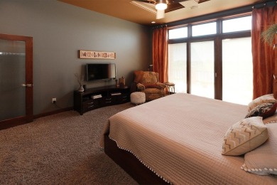 Exquisite design features, functional and luxurious living on The Ridge Golf Club in Iowa - for sale on GolfHomes.com, golf home, golf lot