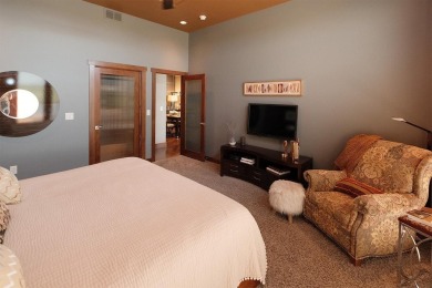 Exquisite design features, functional and luxurious living on The Ridge Golf Club in Iowa - for sale on GolfHomes.com, golf home, golf lot