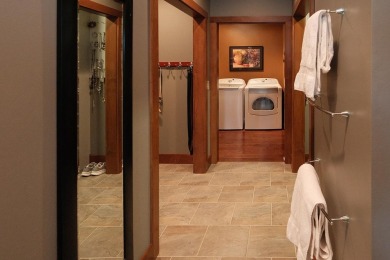 Exquisite design features, functional and luxurious living on The Ridge Golf Club in Iowa - for sale on GolfHomes.com, golf home, golf lot