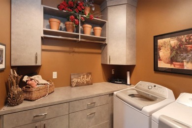 Exquisite design features, functional and luxurious living on The Ridge Golf Club in Iowa - for sale on GolfHomes.com, golf home, golf lot