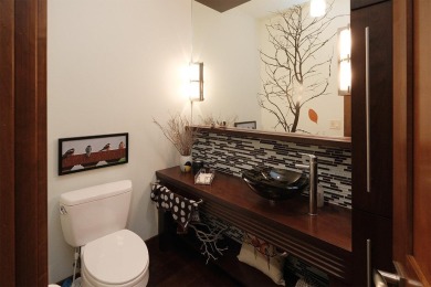 Exquisite design features, functional and luxurious living on The Ridge Golf Club in Iowa - for sale on GolfHomes.com, golf home, golf lot