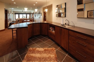 Exquisite design features, functional and luxurious living on The Ridge Golf Club in Iowa - for sale on GolfHomes.com, golf home, golf lot