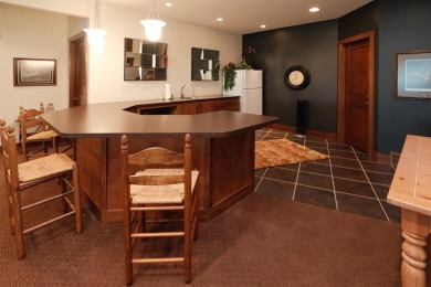 Exquisite design features, functional and luxurious living on The Ridge Golf Club in Iowa - for sale on GolfHomes.com, golf home, golf lot