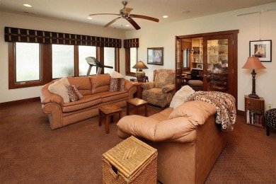 Exquisite design features, functional and luxurious living on The Ridge Golf Club in Iowa - for sale on GolfHomes.com, golf home, golf lot