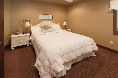 Exquisite design features, functional and luxurious living on The Ridge Golf Club in Iowa - for sale on GolfHomes.com, golf home, golf lot
