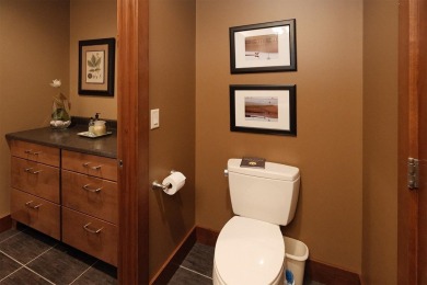 Exquisite design features, functional and luxurious living on The Ridge Golf Club in Iowa - for sale on GolfHomes.com, golf home, golf lot