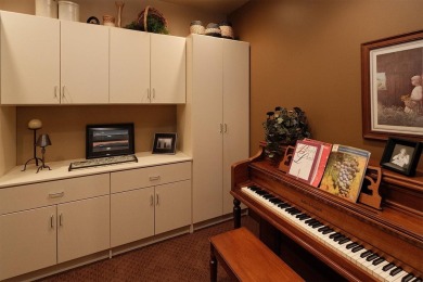Exquisite design features, functional and luxurious living on The Ridge Golf Club in Iowa - for sale on GolfHomes.com, golf home, golf lot