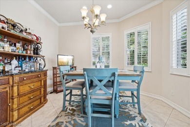 This gorgeous, updated home offers an expansive view of the lake on Gateway Golf and Country Club in Florida - for sale on GolfHomes.com, golf home, golf lot