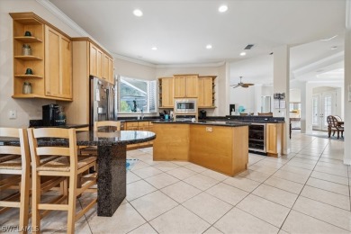 This gorgeous, updated home offers an expansive view of the lake on Gateway Golf and Country Club in Florida - for sale on GolfHomes.com, golf home, golf lot