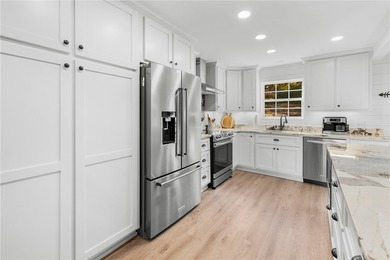 This Lake Hartwell home is one you will want to show your fussy on The Trail At Chickasaw Pointe in South Carolina - for sale on GolfHomes.com, golf home, golf lot