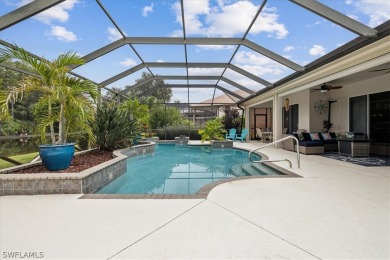 This gorgeous, updated home offers an expansive view of the lake on Gateway Golf and Country Club in Florida - for sale on GolfHomes.com, golf home, golf lot