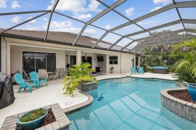 This gorgeous, updated home offers an expansive view of the lake on Gateway Golf and Country Club in Florida - for sale on GolfHomes.com, golf home, golf lot