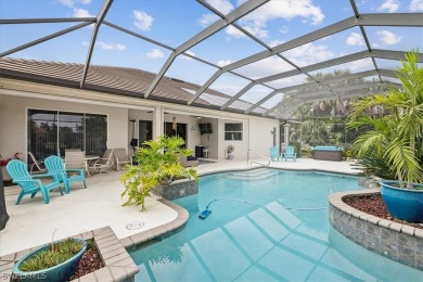 This gorgeous, updated home offers an expansive view of the lake on Gateway Golf and Country Club in Florida - for sale on GolfHomes.com, golf home, golf lot