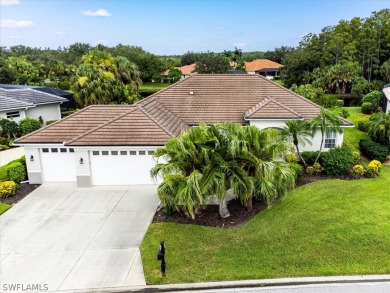 This gorgeous, updated home offers an expansive view of the lake on Gateway Golf and Country Club in Florida - for sale on GolfHomes.com, golf home, golf lot