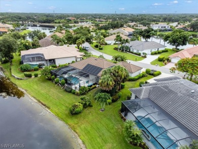 This gorgeous, updated home offers an expansive view of the lake on Gateway Golf and Country Club in Florida - for sale on GolfHomes.com, golf home, golf lot