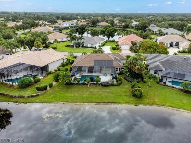 This gorgeous, updated home offers an expansive view of the lake on Gateway Golf and Country Club in Florida - for sale on GolfHomes.com, golf home, golf lot